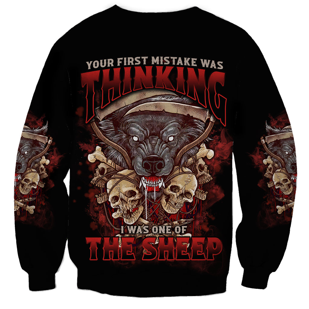 Black sweatshirt with large skull monster graphic and red headline text on front