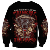 Black sweatshirt with large skull monster graphic and red headline text on front