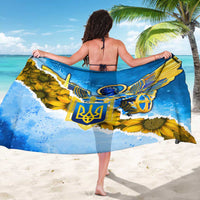 Blue and yellow sarong with angel emblem, trident details, sunflower print, beach drape