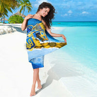 Blue and yellow trident emblem sarong with sunflower design, beach wrap detail