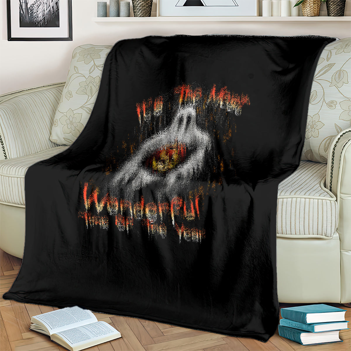 Black Halloween blanket close view of ghost face with jack-o-lantern and orange text