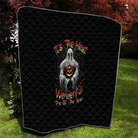 Black quilt with rounded corner view, diamond stitching and ghost with jack-o-lantern artwork