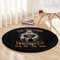Black round Halloween rug with gray ghost and orange jack-o'-lantern, orange speckle details