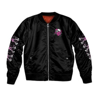 Black zipped bomber jacket with pink rose chest patch, ribbed hem and sleeve skull art