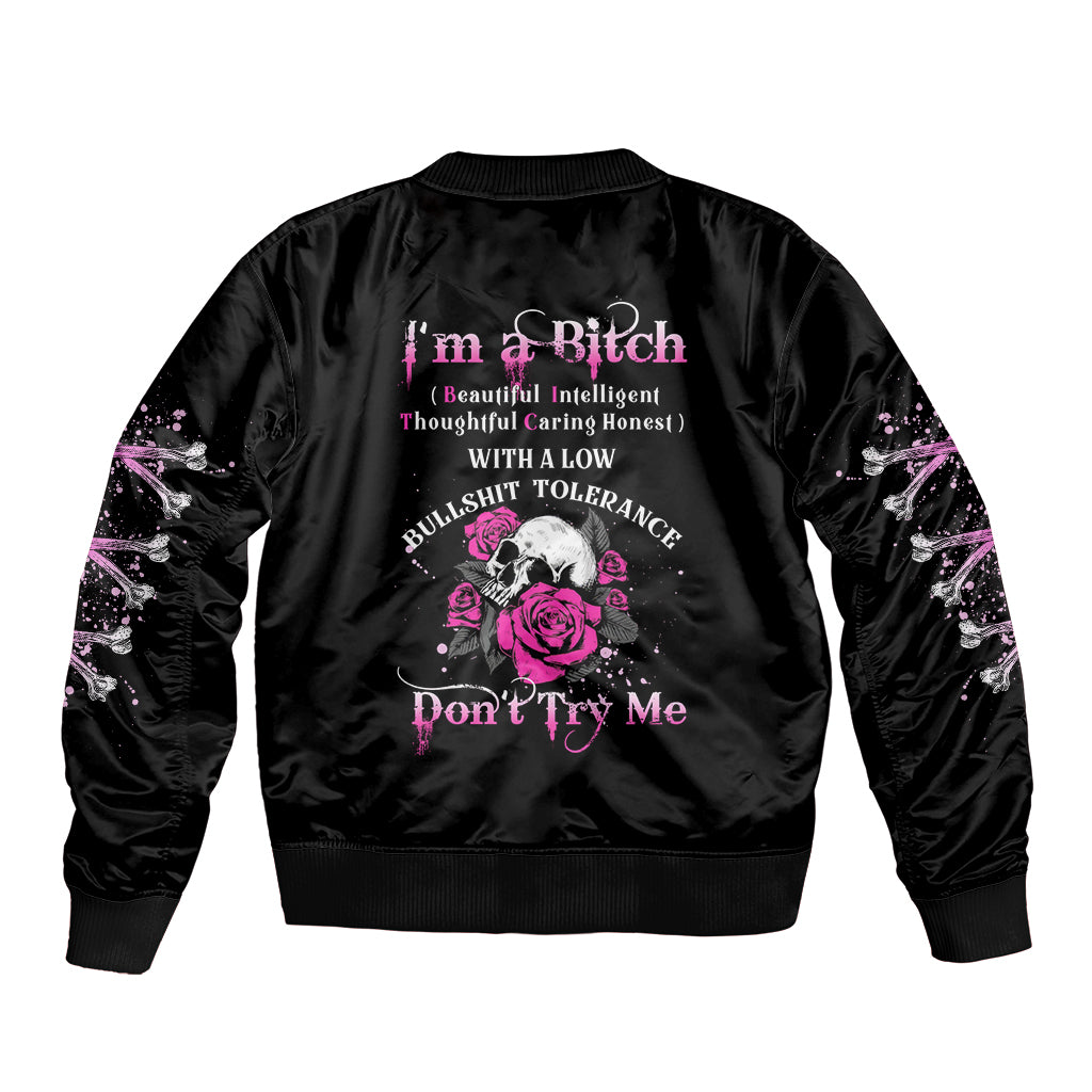 Black satin bomber jacket with pink rose-skull graphic, ribbed collar and cuffs