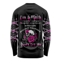 Black long sleeve shirt with pink rose skull graphic on back