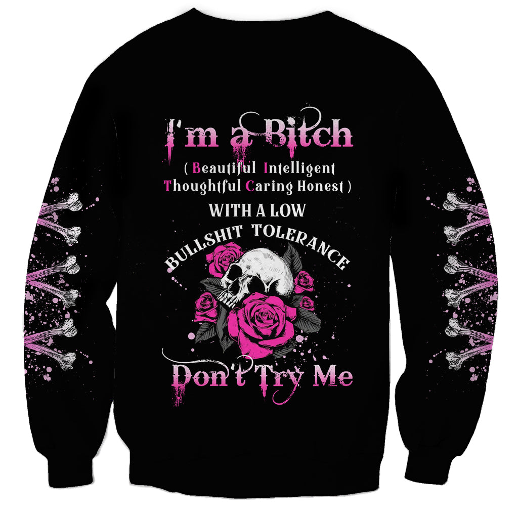 Black crewneck sweatshirt with pink skull and rose graphic, 'Don't Try Me' text.