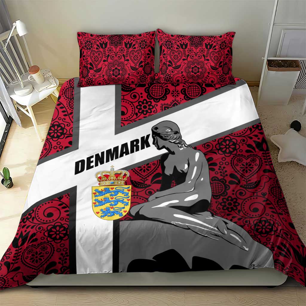 Red bedding set with mermaid figure on white cross stripe and two patterned pillowcases