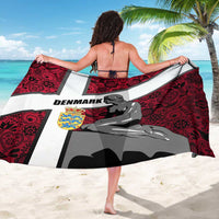 Red and white sarong wrapped on back view, Denmark text and mermaid statue print