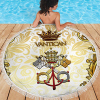 Round beach blanket laid flat featuring Vatican crest, gold crown and keys, white fringe border