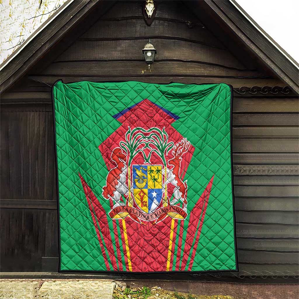 Green quilted blanket hanging display with central red crest and shield emblem, diamond stitching.