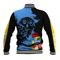 Back of baseball varsity jacket in blue and black with mascot face graphic and rib trim