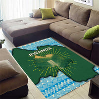 Green Rwanda map area rug with blue patterned border and yellow sunburst lines over map