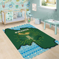 Green Rwanda map area rug with blue geometric border, yellow rays, RWANDA lettering