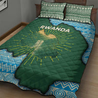 Green quilt with Rwanda map and yellow lines, blue patterned reverse, two green patterned pillows