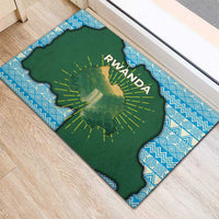 Green Rwanda map doormat with RWANDA text and sunburst rays on blue geometric border