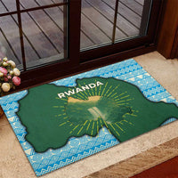 Green Rwanda map rubber doormat with RWANDA lettering and sunburst rays, blue border