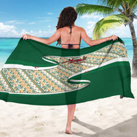 Algerian green sarong with Arabic calligraphy and geometric pattern, wrap tied