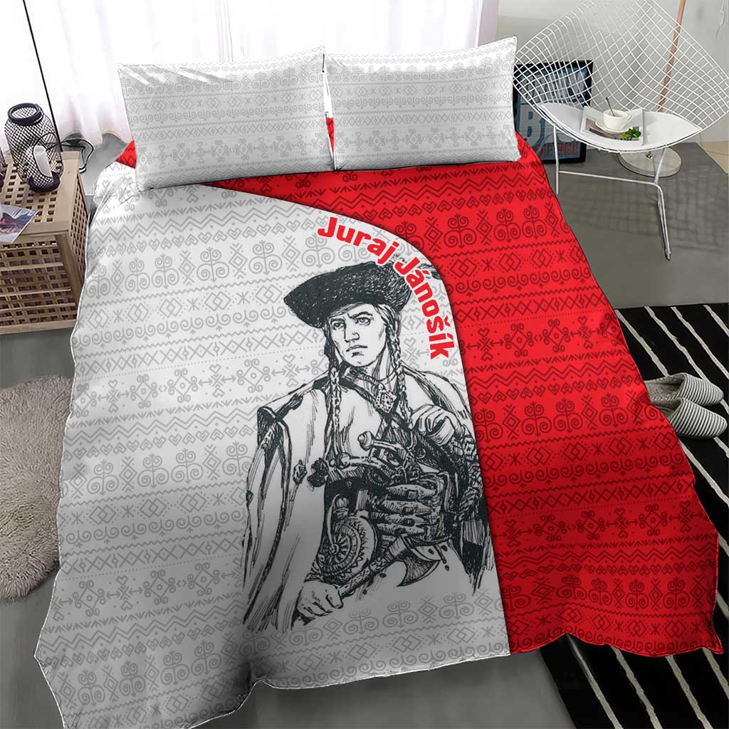 Close view of red and white folk pattern duvet cover with warrior graphic and pillows