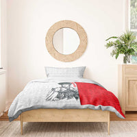 Red and white folk pattern duvet cover with warrior graphic, bed with matching pillow