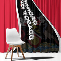 Close-up of red curtains with black-and-white diagonal crest and emblem print