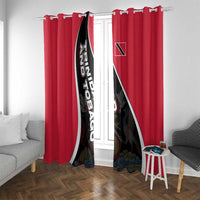 Red window curtains with black-and-white diagonal crest graphic on one side