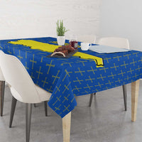 Asturias flag tablecloth with blue base, yellow Asturias map, draped over table edge