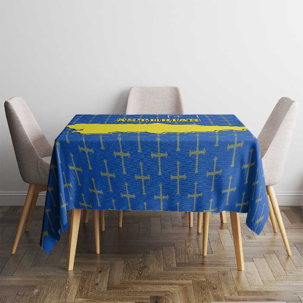 Asturias flag tablecloth on dining table, blue with yellow Asturias map and cross pattern