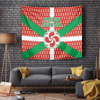 Basque Country flag tapestry with red pattern, green X bands, circular emblem and cross stripes