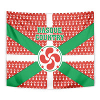 Basque Country flag tapestry close-up with green X rays and red circular emblem on red field