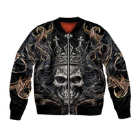 Black bomber jacket with front zip and detailed skull crown graphic in gold and gray