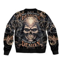 Black bomber jacket with back skull graphic and ornate flames, ribbed cuffs and hem