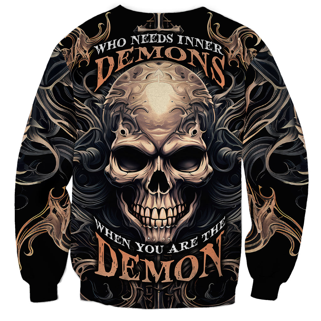 Black unisex sweatshirt with skull graphic and bold 'inner demons' wording
