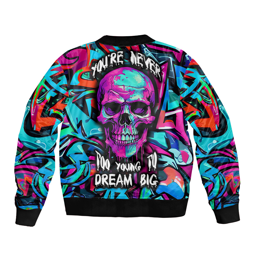 Multicolor bomber jacket with back skull graphic and 'Dream Big' lettering, black ribbed hem