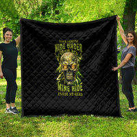 Black quilt with neon skull graphic and “hide under your bed” text, quilted diamonds
