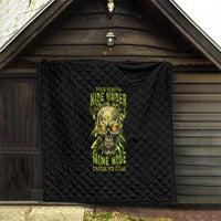 Black quilt displayed on a porch wall with neon skull graphic and glow text