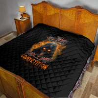 Black quilted bed blanket with devil fire artwork and stitched text design