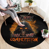 Black round horror-style carpet with glowing skull face, flame accents, and slogan text.
