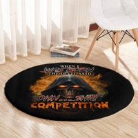Black round carpet with flaming skull artwork and bold “ohh shii” text, multicolor print.