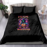 Black Halloween bedding set with colorful witch-and-pumpkin graphic and 'unsupervised' text
