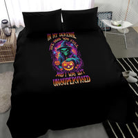 Black Halloween bedding set with witch holding pumpkin graphic and two matching black pillowcases