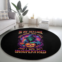 Black round Halloween carpet with colorful skull and pumpkin graphic on living room floor