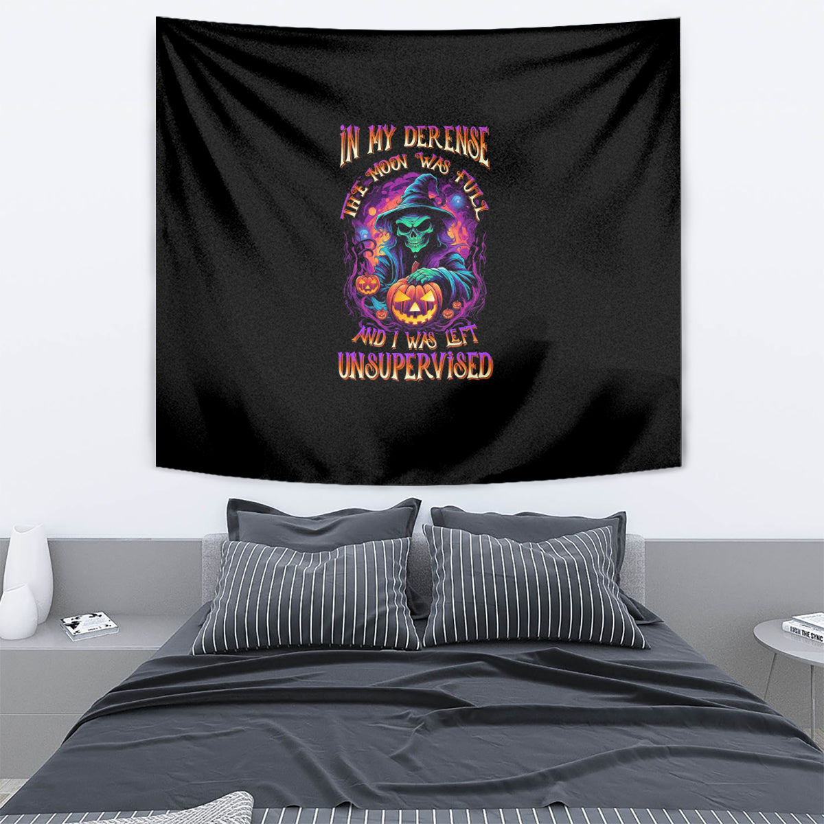 Black Halloween tapestry with multicolor pumpkin witch graphic and stacked text