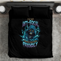 Black duvet cover bedding set with teal skull front graphic and two pillowcases