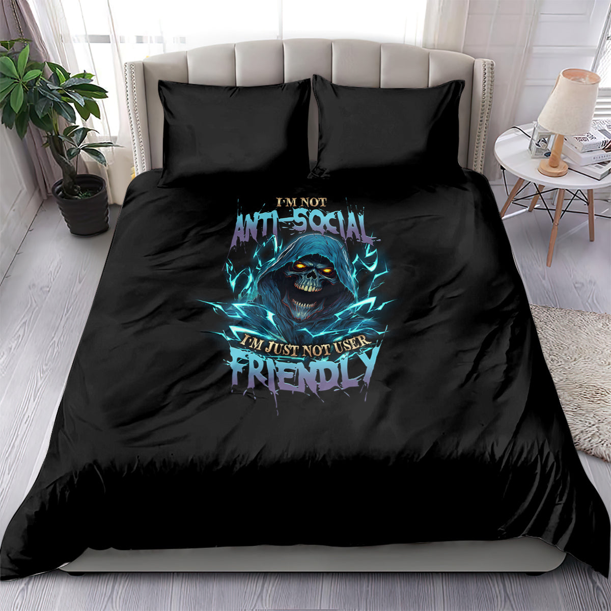 Black bedding set with teal skull graphic and text on duvet and matching pillowcases