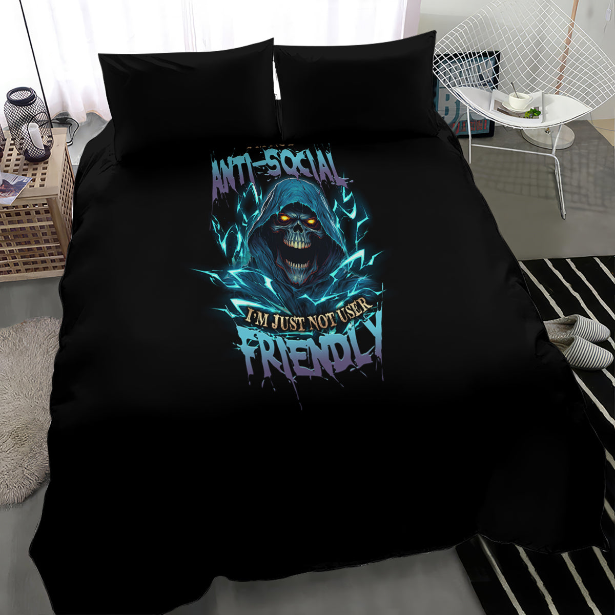 Black duvet cover and pillowcases with teal skull artwork and slogan text