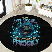 Round black rug with centered blue skull and 'not user FRIENDLY' wording