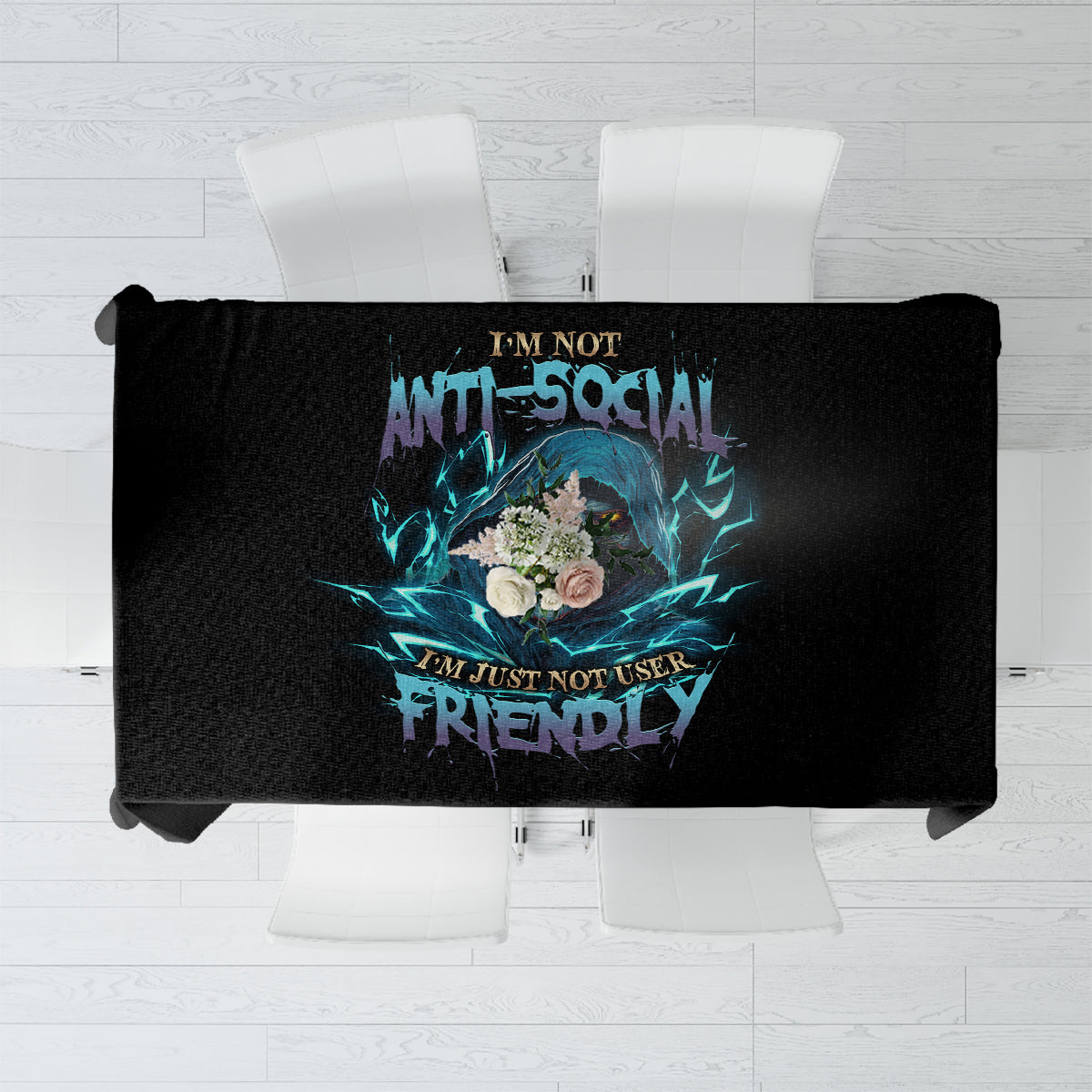 Black tablecloth with multicolor skull and text graphic, centered