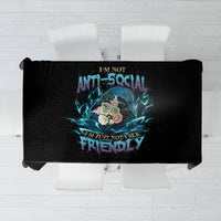Black tablecloth with multicolor skull and text graphic, centered