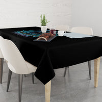 Black tablecloth with dark blue graphic on the front edge